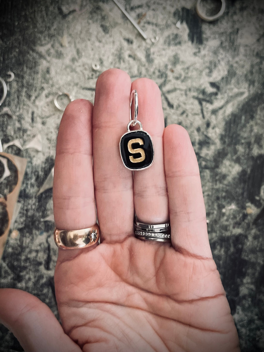 1930s glass letter pendant