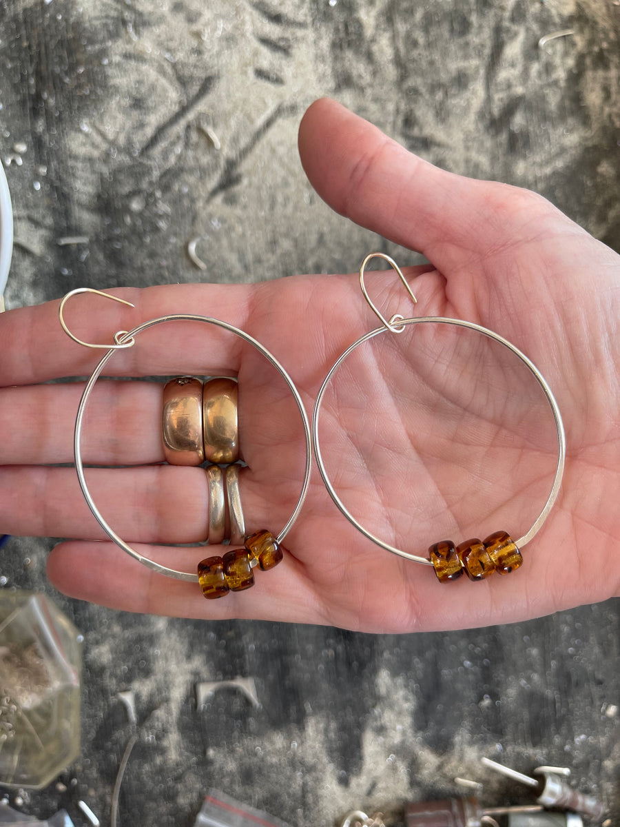 Swingy oval hoop earrings - tortoiseshell with 9ct gold hooks