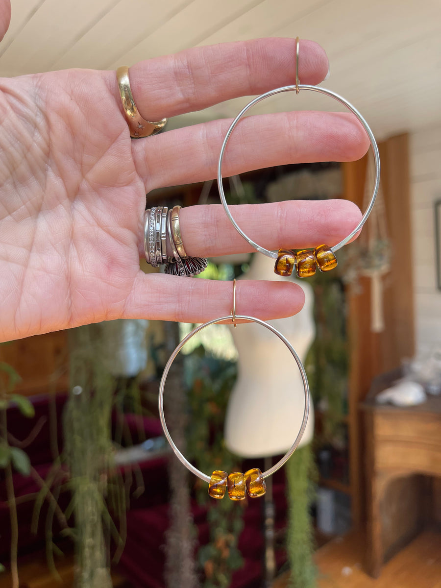 Swingy oval hoop earrings - tortoiseshell with 9ct gold hooks
