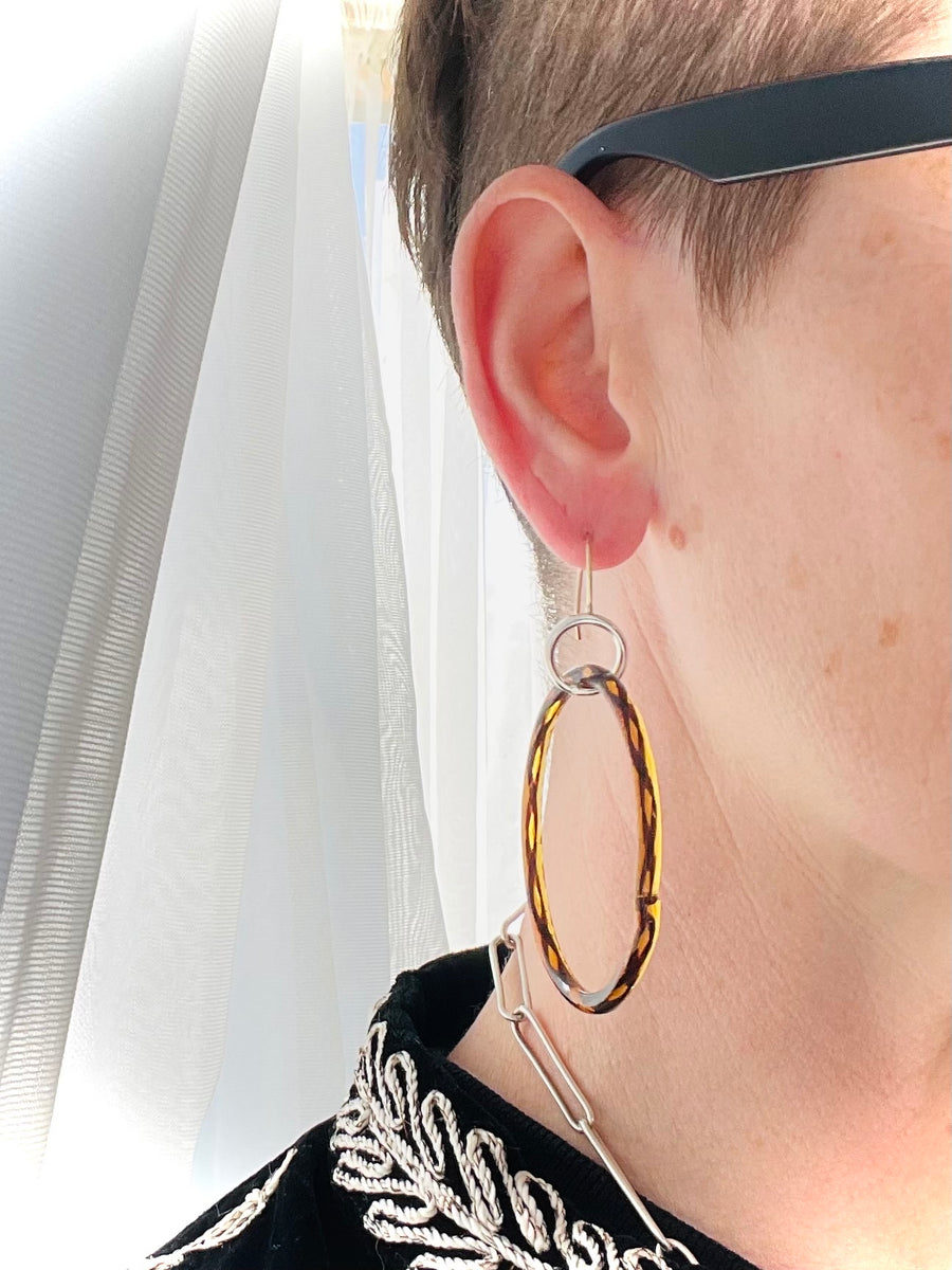 Lu earrings - mismatched blacks and oranges